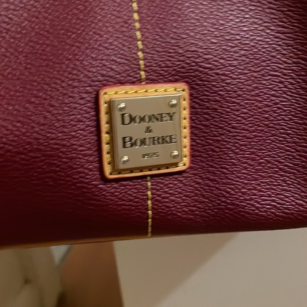 DOONEY&BOURKE NWOT NEVER USED! She’s beautiful!!